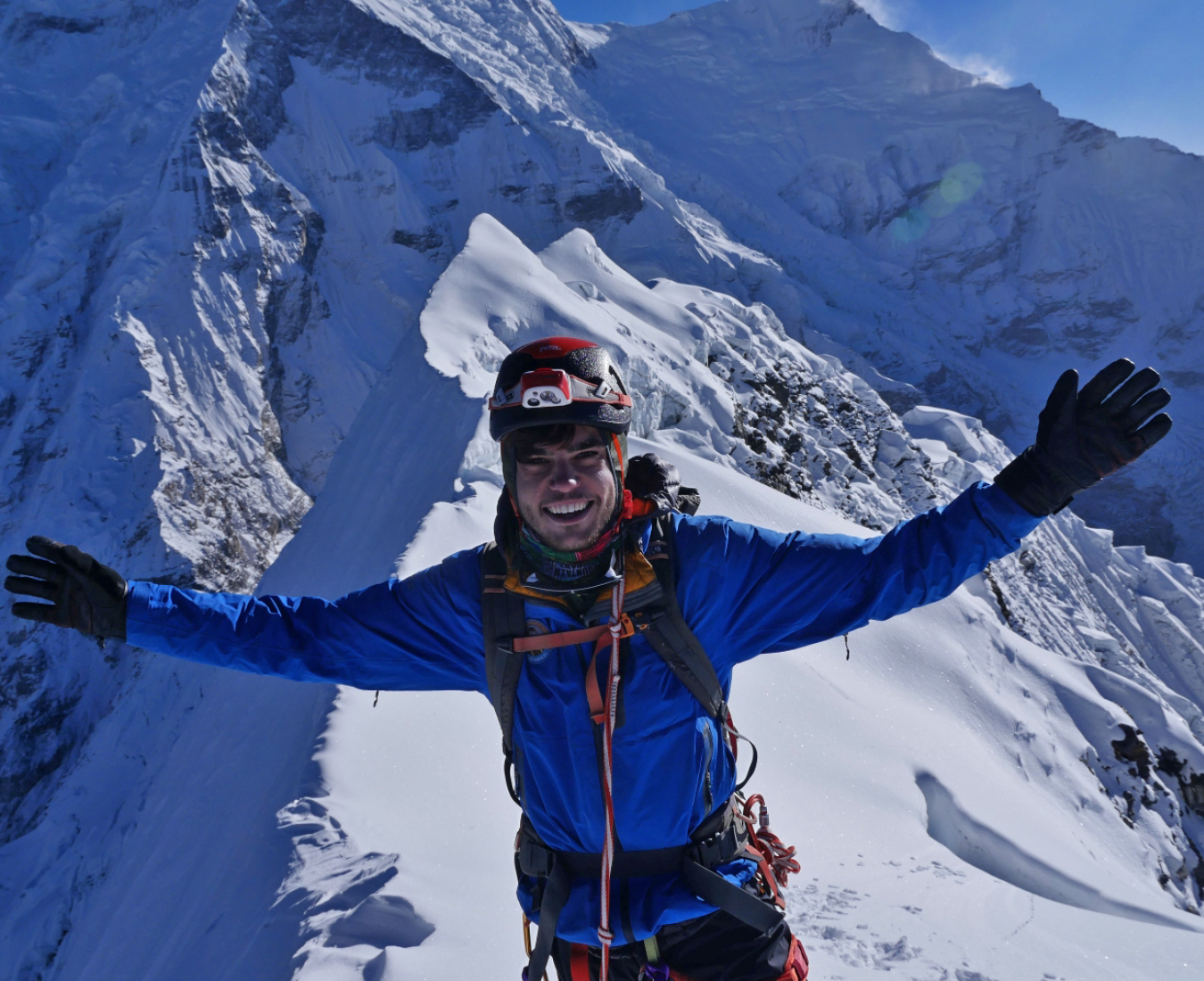 A climber celebrates on Lobuche East! The first of three fantastic climbs on the Three Peaks Expedition.